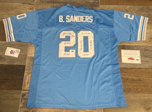 Barry Sanders autographed Detroit Lions Mitchell & Ness jersey With many inscriptions